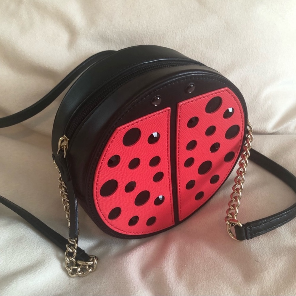 Kate spade ladybug crossbody bag. Gold hardware.